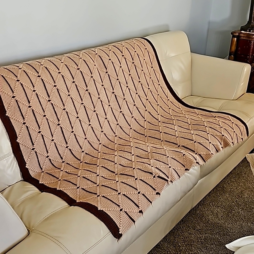 Hand Crocheted afgan. Brown and tan. Beautifully crafted. About 60" by 60". No